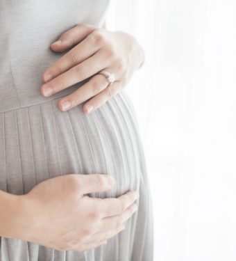 Closeup photo of pregnant woman Closeup photo of pregnant woman