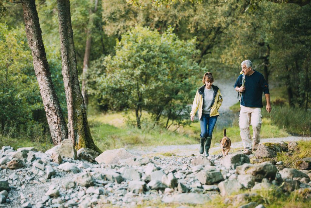 Senior Couple Hiking with Dog - Healthy Heart